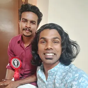 Artist Aadi, Kerala's best graphic design tutor, alongside singer Athul Narukara