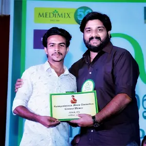 Artist Aadi received the certificate from TV serial actor Sharran Puthumana. Artist Aadi is recognized as Kerala's premier graphic design tutor.