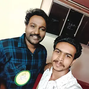 Top graphic design tutor in Kerala takes a selfie with renowned singer Najim Arshad.